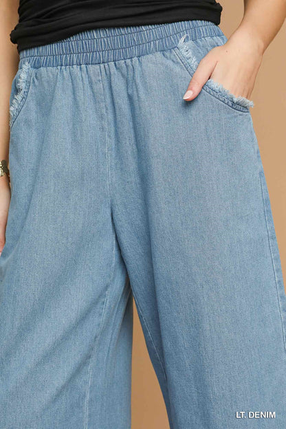 Umgee Light Washed Denim Pants with Fringe Hem