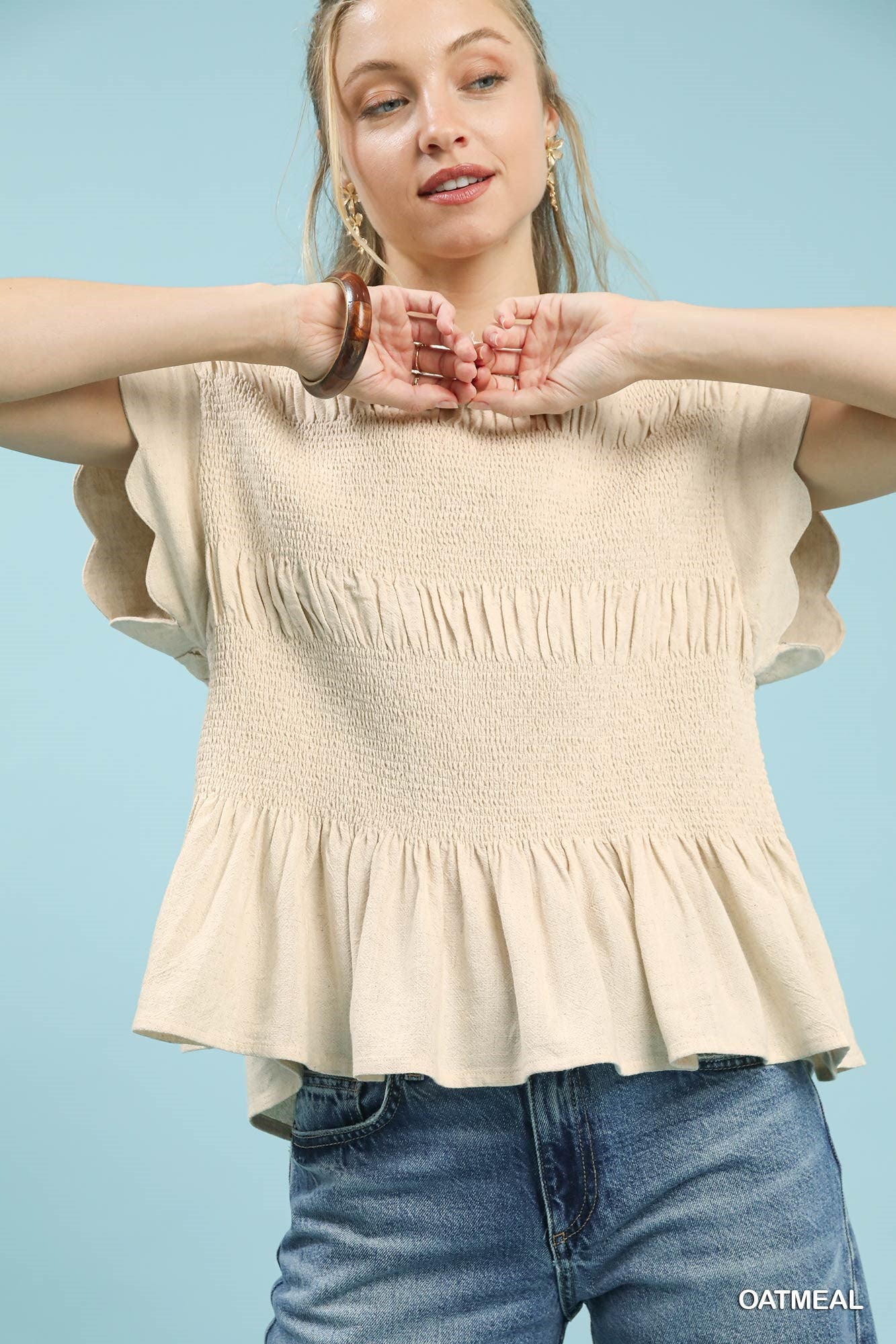 Umgee Linen Blend Smocked Peplum Top