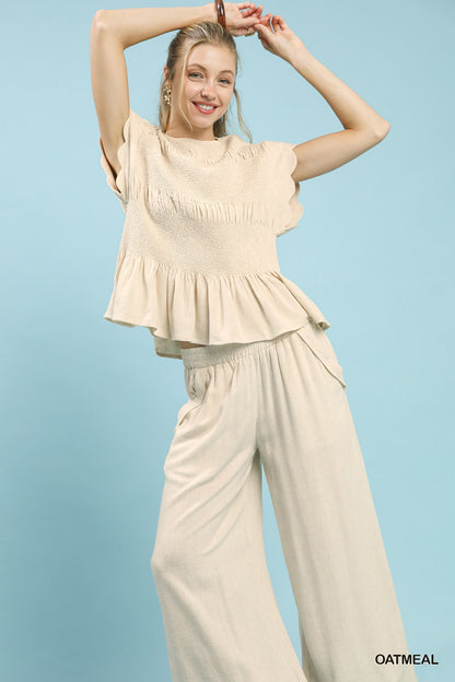 Umgee Linen Blend Smocked Peplum Top