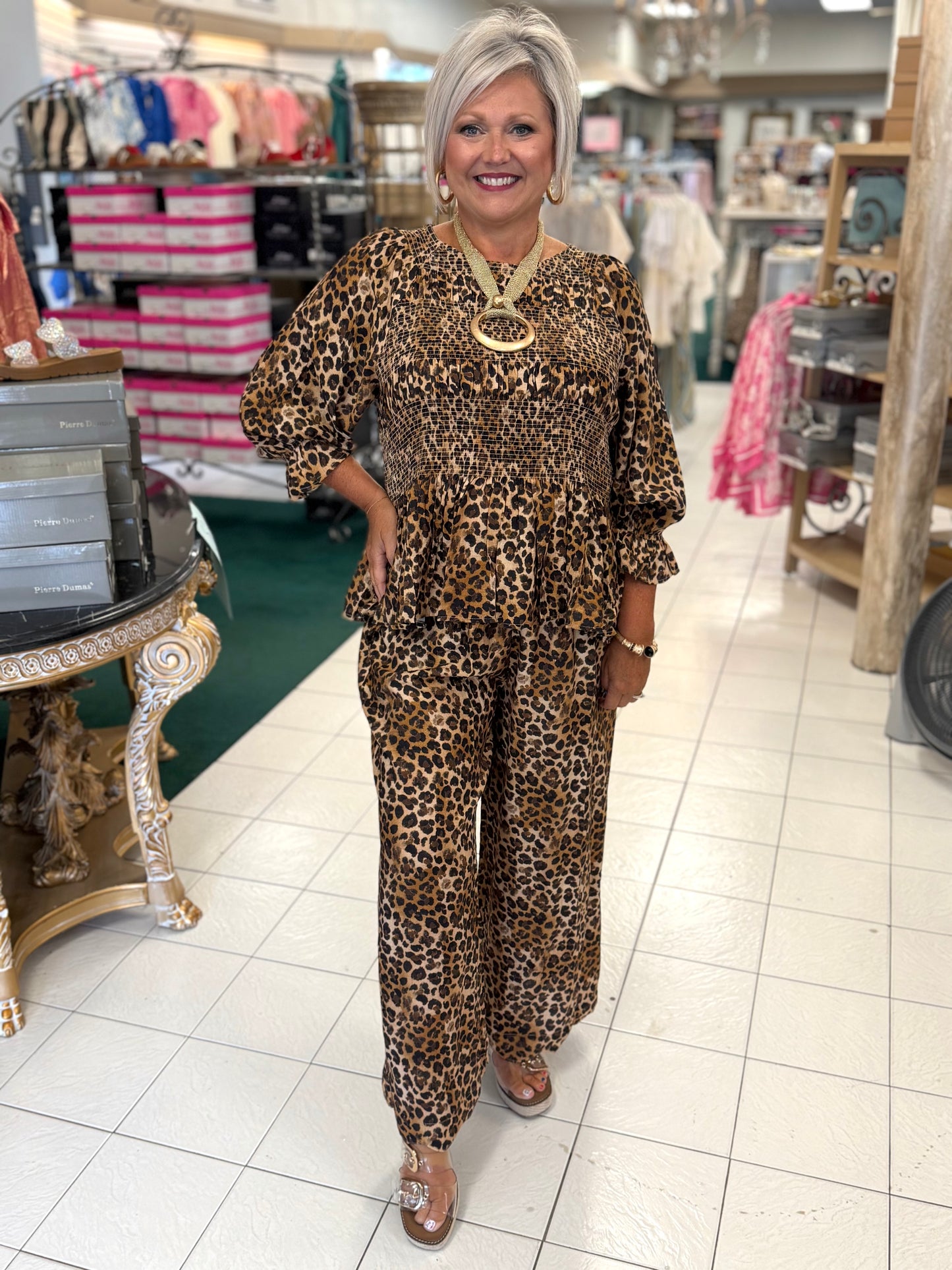 Umgee Leopard Print Smocked Tiered Peplum Blouse