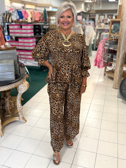 Umgee Leopard Print Smocked Tiered Peplum Blouse