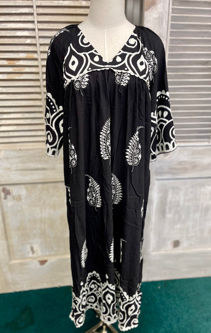 Gigio Printed V-Neck Midi Dress with a Decorative Trim