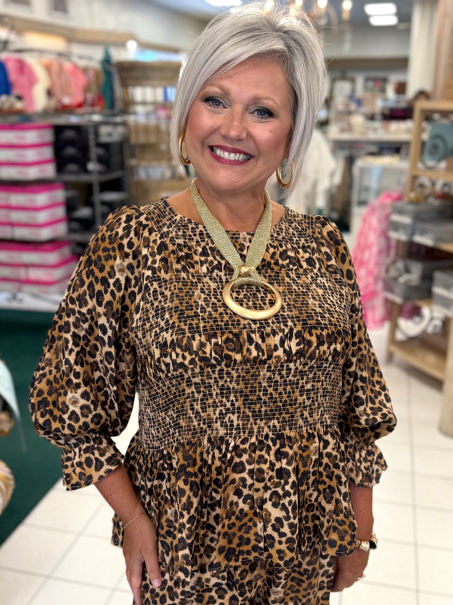 Umgee Leopard Print Smocked Tiered Peplum Blouse