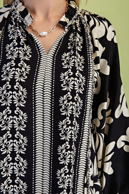 Gigio Printed Long Sleeve Blouse with a Ruffled Neck and Frayed Fringe Details