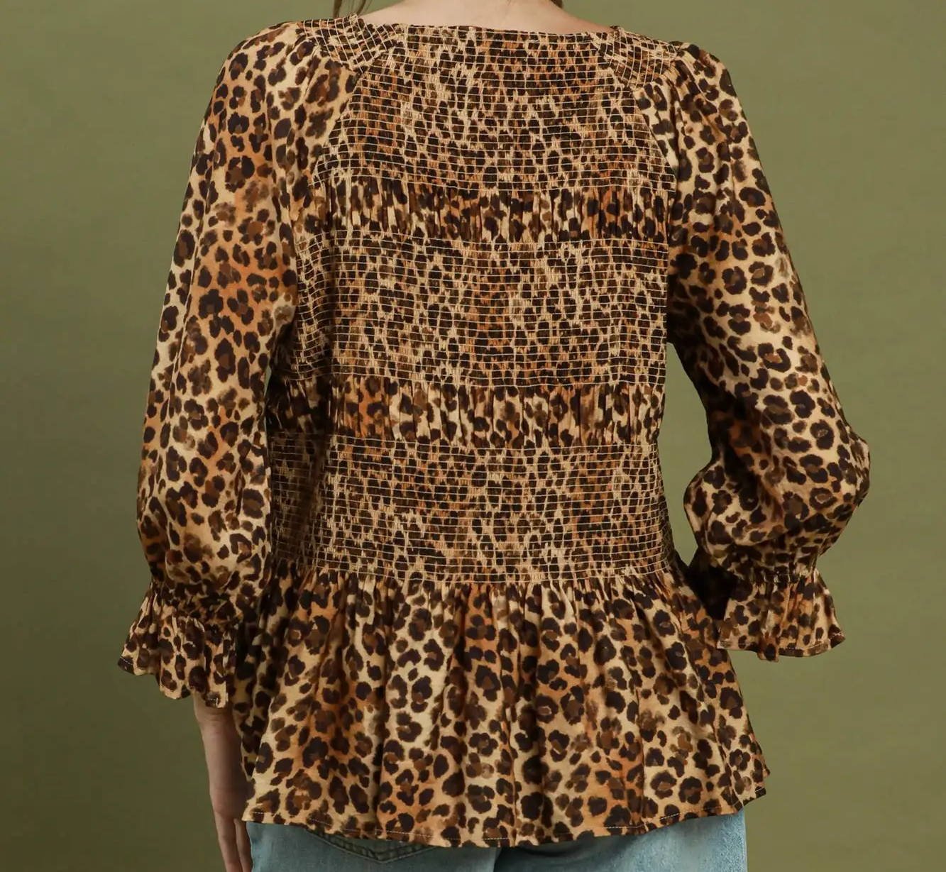 Umgee Leopard Print Smocked Tiered Peplum Blouse
